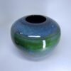 Evergreen memorial urn without lid showing navy blue to forest green gradient glaze