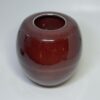 Flame 900ml cremation urn without lid showing rounded form and rich burgundy finish