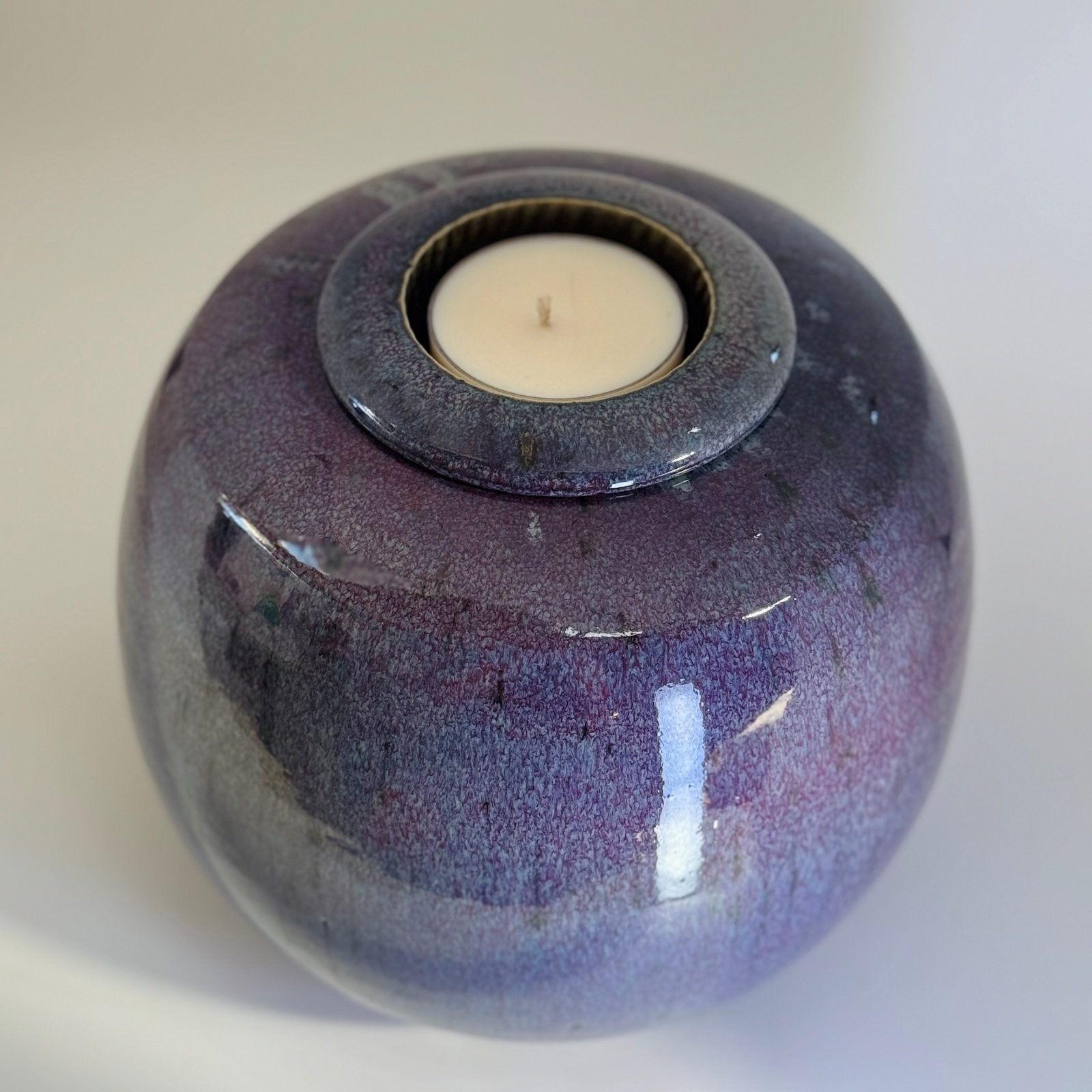 Nebula - Large Cremation Urn 3300gm (3.1) Nebula memorial urn top view with candle holder showing purple starry glaze detail