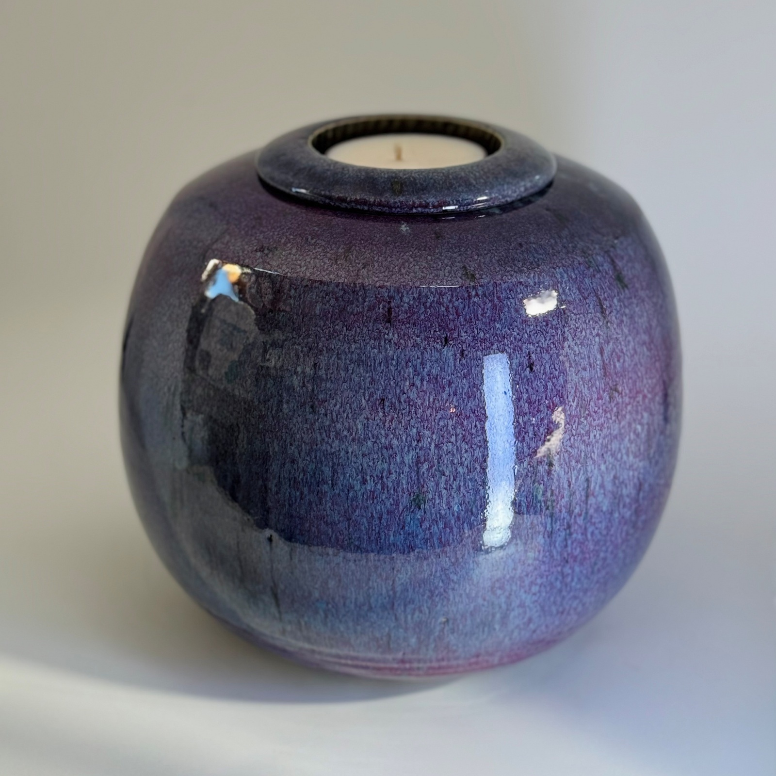 Nebula - Large Cremation Urn 3300gm (4.1) Large ceramic urn in deep purple and periwinkle blue with glossy celestial glaze