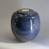 Purple Rain small ceramic cremation urn with deep purple and blue gradient glaze and tealight holder