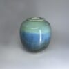 Seafern small ceramic cremation urn with sea green to blue ombre glaze and tealight holder