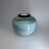 Seagem - Medium Cremation Urn 2500ml (1) Seagem ceramic cremation urn with ocean blue wave glaze and black tealight candle holder lid