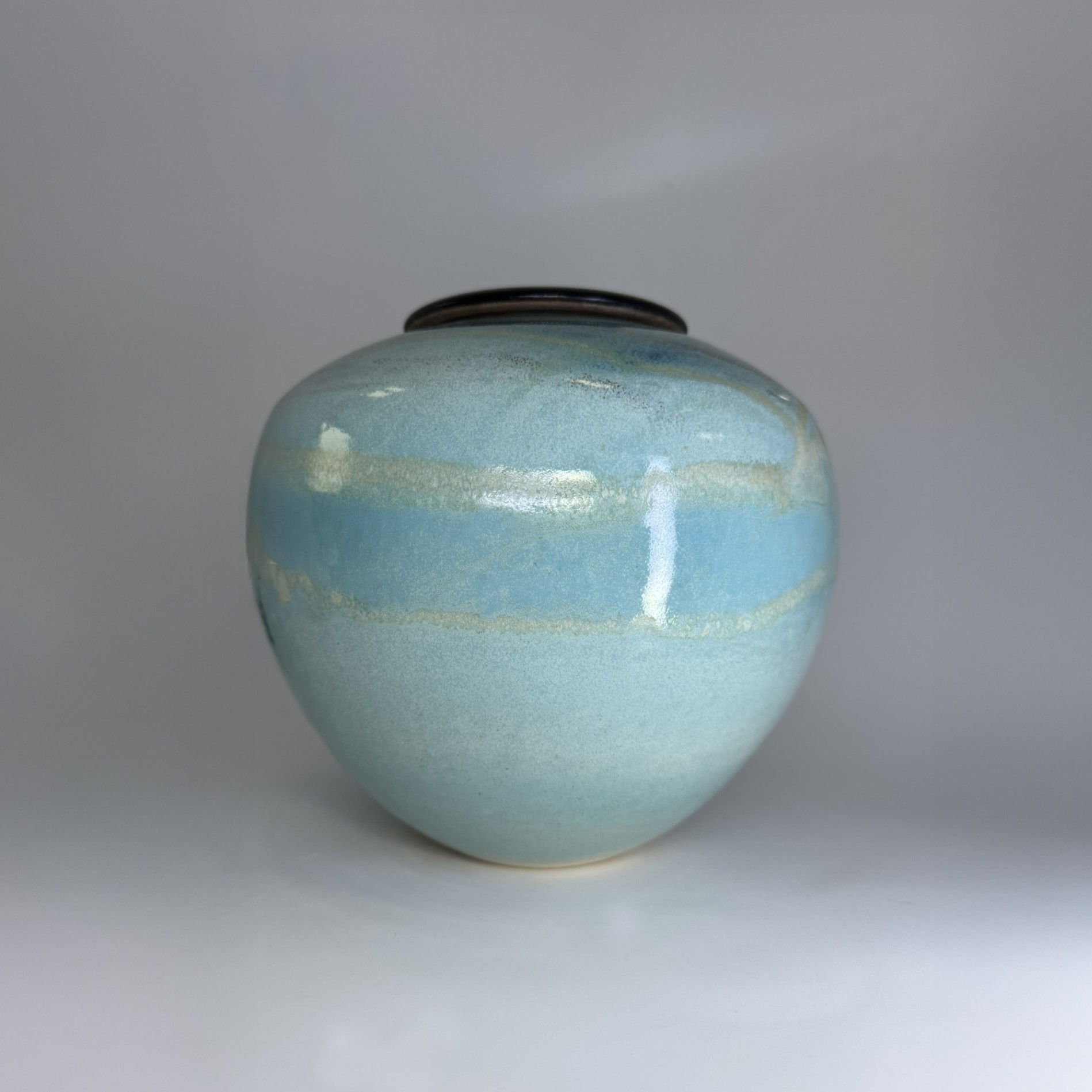 Seagem - Medium Cremation Urn 2500ml (3) Seagem 2500ml cremation urn front view showing aqua blue glossy glaze with natural variations