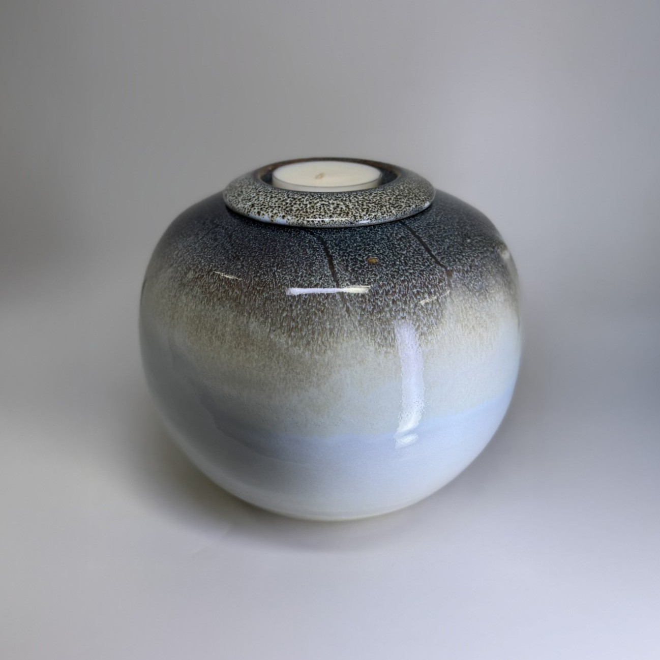 Handmade large memorial urn in grey gradient with textured speckled glaze finish