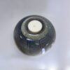 Large ceramic urn top view showing candle holder and detailed textured glaze pattern